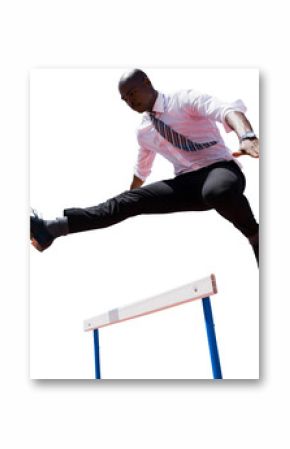 Digital png photo of african american businessman jumping over hurdle on transparent background