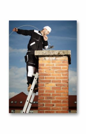 Man cleaning chimney