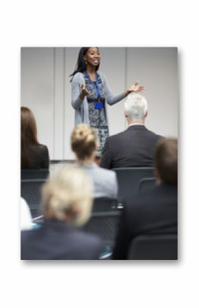 Businesswoman Making Presentation At Conference