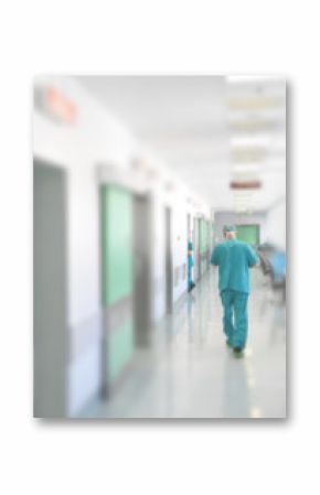 Doctors and nurses walking in hospital hallway, blurred motion.