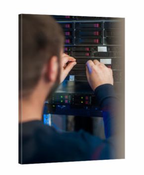 network engineer working in server room