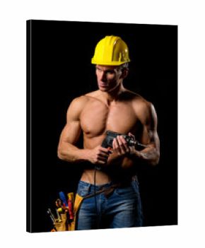 fit shirtless worker with drill and tools