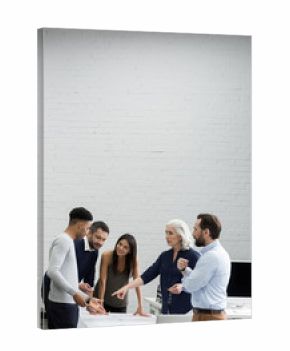 Group of serious business people having a brainstorm meeting