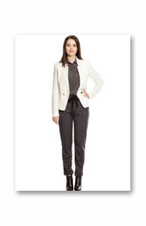 Young businesswoman  in pants and suit standing on white background