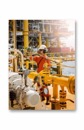 operator recording operation of oil and gas process at oil and rig plant, offshore oil and gas industry, offshore oil and rig in the sea, operator monitor production process, routine daily record.