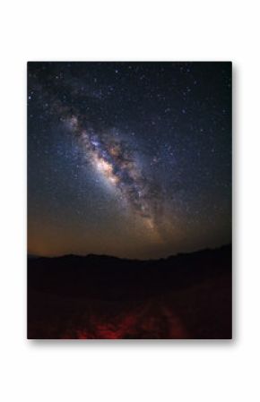 Milky way galaxy with stars over moutain at Phu Hin Rong Kla National Park,Phitsanulok Thailand, Long exposure photograph.with grain