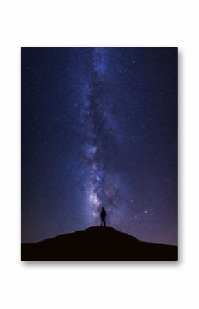 Landscape with milky way, Night sky with stars and silhouette of man standing on high moutain