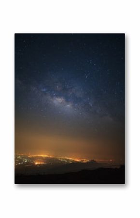 milky way galaxy and city light at Phutabberk Phetchabun in Thailand.Long exposure photograph.With grain