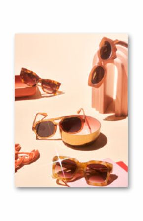 Composition of shiny sunglasses and decorations