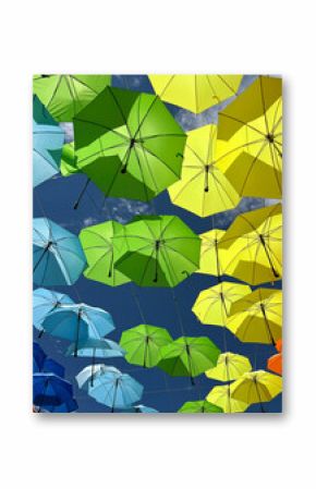 Colorful Parasol Sunshade outdoors in summer season  on street 