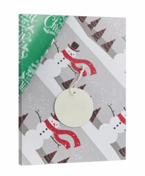 Round blank label on Christmas paper