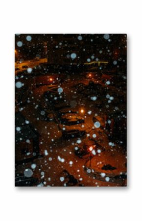Snowfall in a residential area.