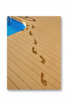 Wet footprints on poolside floor