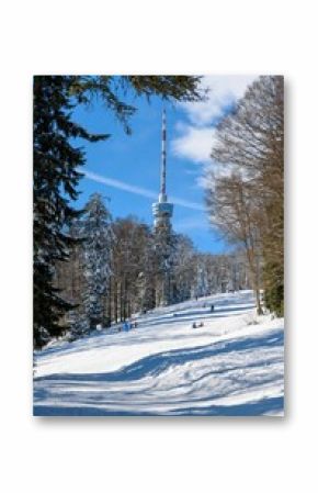 Vertical shot of a TV tower seen from a ski slope near Zagreb in Croatia