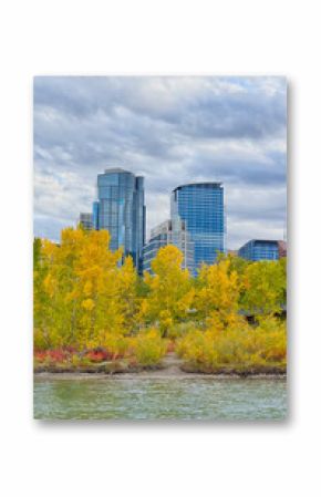 Autumn landscape of the Bow river in downtown Calgary with highrises in the background, Alberta, Canada