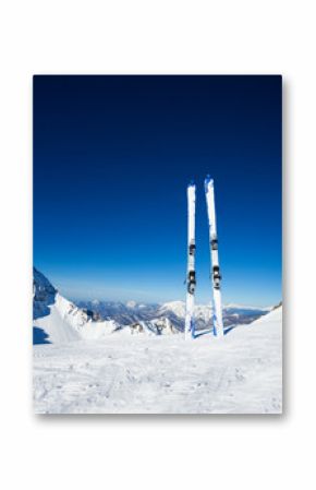 Two skies in snow on mountain ski resort