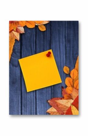 Autumn leaves with yellow note