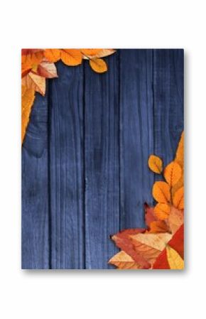 Flat design blue wooden plank surface is being framed by vibrant orange autumn leaves, copy space