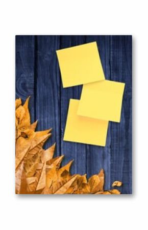 Autumn leaves with yellow note