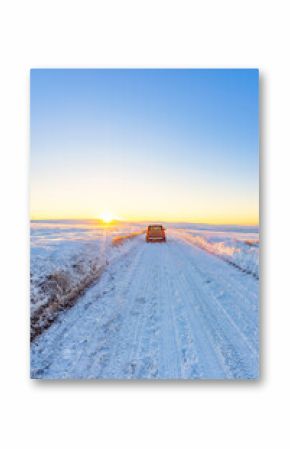 UK, Scotland, East Lothian, Winter sunrise over road through rural landscape