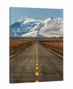 Beautiful view of snow mountain and the national highway in Dingri County, Xigaze, Tibet, China