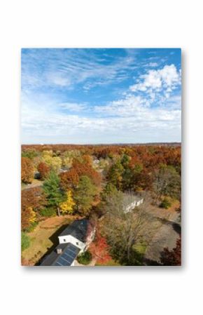 Cloudy blue sky over suburban foliage scene in Longmeadow Massachusetts