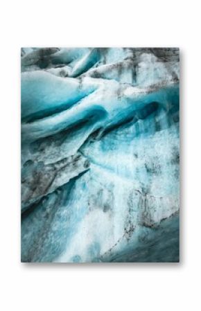 Vertical shot of icy glaciers and wild nature in Alaska in daylight