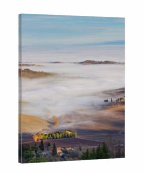 Tuscan landscape in the fog, Montepulciano (Italy).