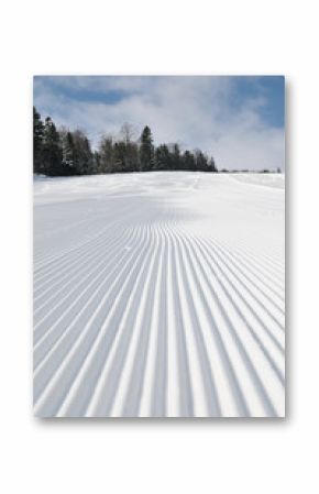 tracks on ski slopes at beautiful sunny  winter day