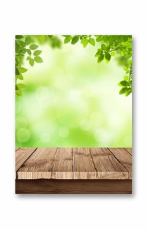 Fresh spring green bokeh background with wooden table