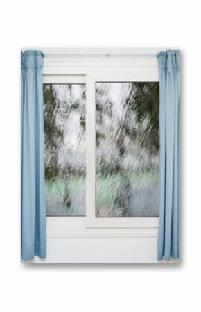 Closed window with curtains in rainy autumn weather