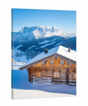 Wooden mountain chalet in the alps in winter