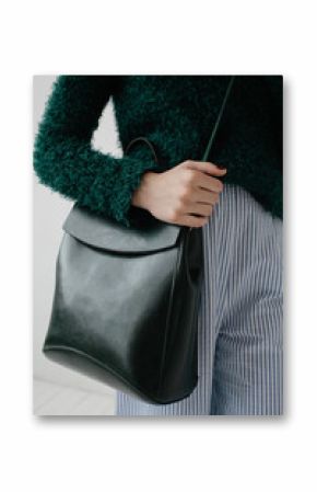 Stylish woman holding bag