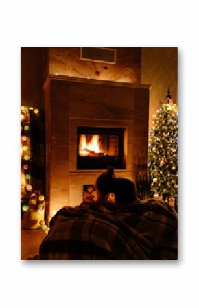 Anonymous couple by the fireplace