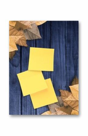 Autumn leaves with yellow note