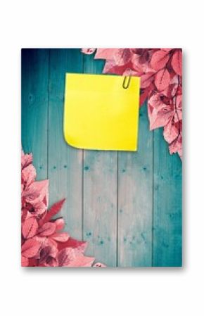 Autumn leaves with yellow note