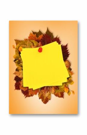 Autumn leaves with yellow note