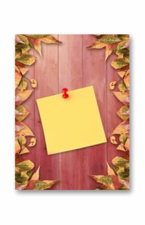 Autumn leaves with yellow note