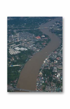 city view forest tree river in middle from airplane view up in sky / airplane city view