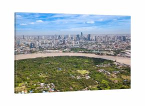 Aerial View of Bangkok skyline and view of Chao Phraya River View from green zone in Bang Krachao, Phra Pradaeng, Samut Prakan Province.