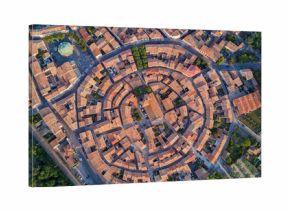 Aerial top view of Bram medieval village architecture and roofs from above, Southern France  