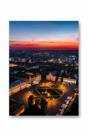 Union Square Timisoara - aerial view at blue hour with nice red horizon over the city lights