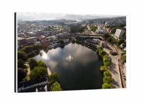 Fountain in the middle of lake in Stavanger city, aerial view