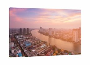 River curved over Bangkok city downtown skyline with after sunset sky background, Thailand