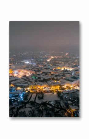 Winter night aerial view from Timisoara taken by a professional drone in the snow. Snow-covered historic center of the city