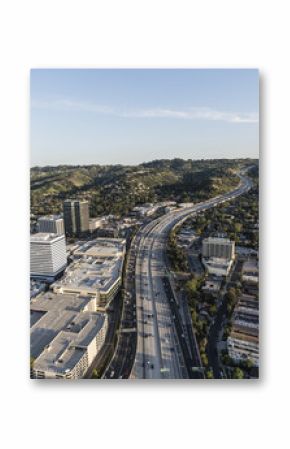 Late afternoon aerial view of San Diego 405 Freeway near Ventura Blvd in the San Fernando Valley area of Los Angeles, California.