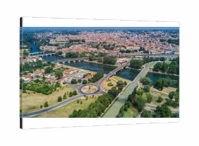 Aerial top view of Beziers town, river and bridges from above, South France  