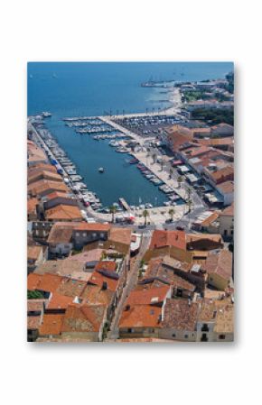 Aerial top view of boats and yachts in marina from above, harbor of Meze town, South France  