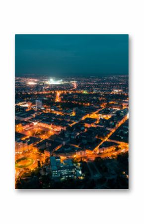 Old town Timisoara with beautiful city lights at blue hour - aerial view taken by a professional drone
