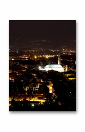 city lights at night and the illuminated monuments